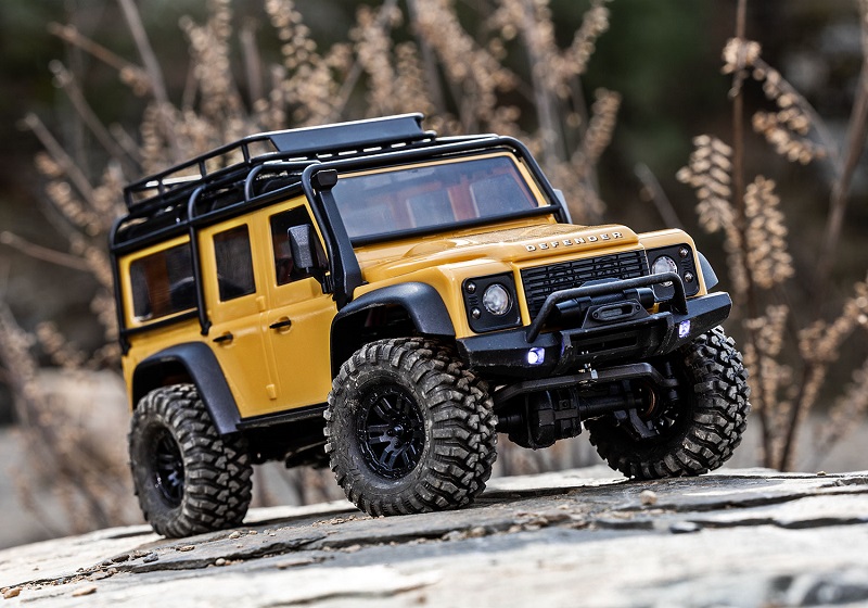 TRX97054-1-TAN Traxxas TRX-4M Land Rover Defender 1:18 RTR 4WD Mini RC  Crawler Tan Brushed mit Akku/Lader